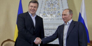 Víctor Yanukóvich en visita oficial a Rusia saludando a Vladimir Putin