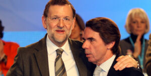 Mariano Rajoy junto a José María Aznar