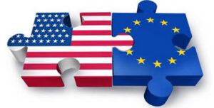 Piezas de puzzle con las banderas de EEUU y la UE