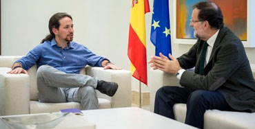 Pablo Iglesias junto a Mariano Rajoy