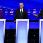 Elizabeth Warren, Joe Biden y Bernie Sanders en un debate de los precandidatos demócratas a la Casa Blanca