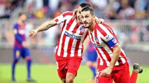 Koke y Correa celebran el primer gol del Atlético ante el Barça