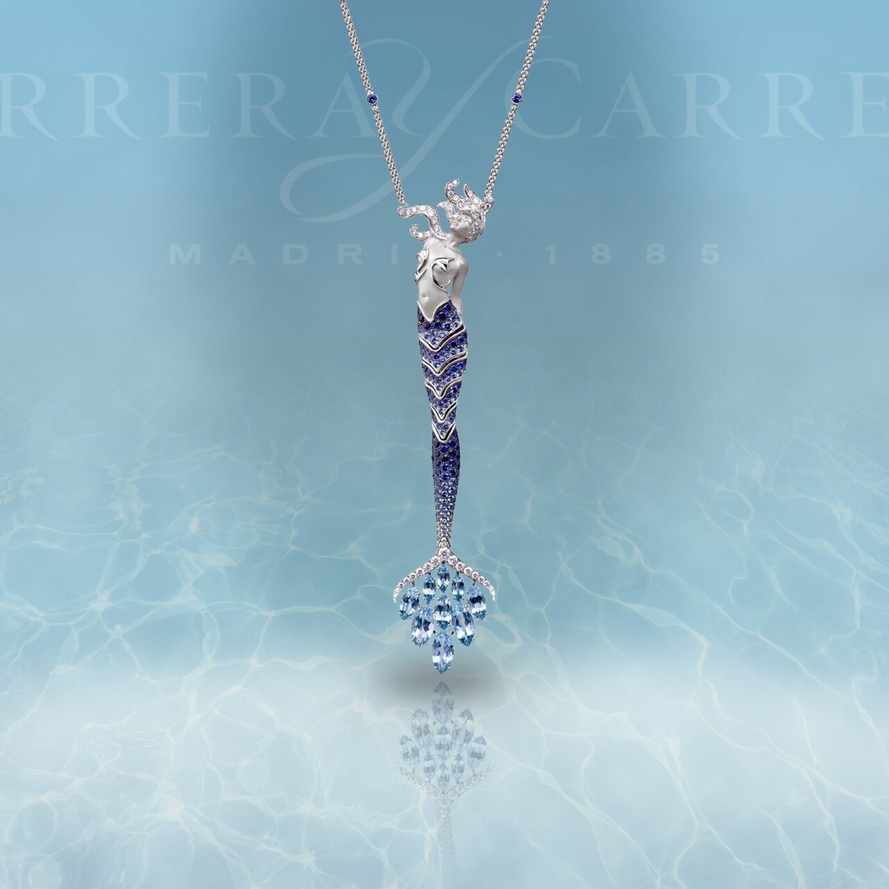 Colgante de oro blanco con dise&ntilde;o elegante y piedras preciosas