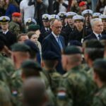 Friedrich Merz durante un acto militar en Vilna (Foto: Europa Press/Contacto/Yauhen Yerchak)